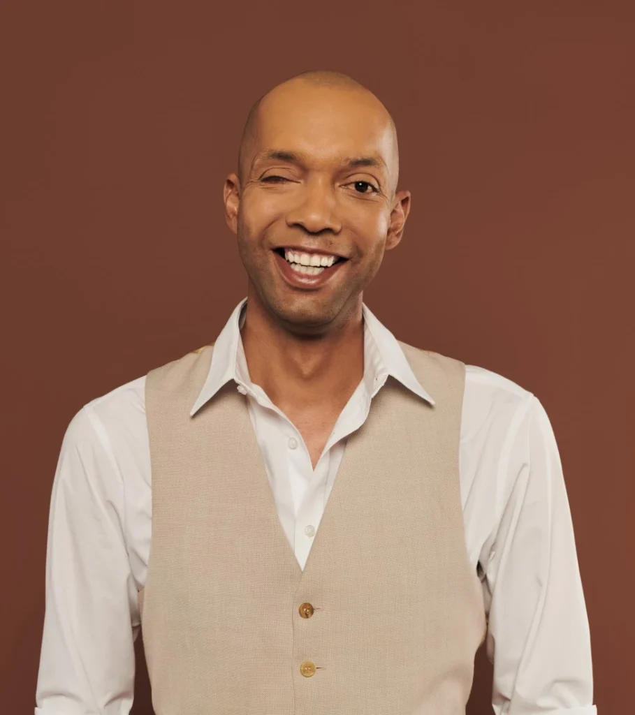 Disabled blind man smiling at the camera